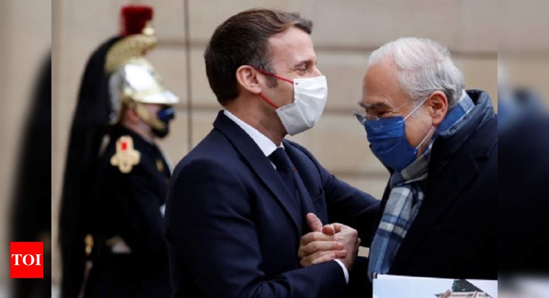 From bows to handshakes, how Macron let social distancing slip - Times of India