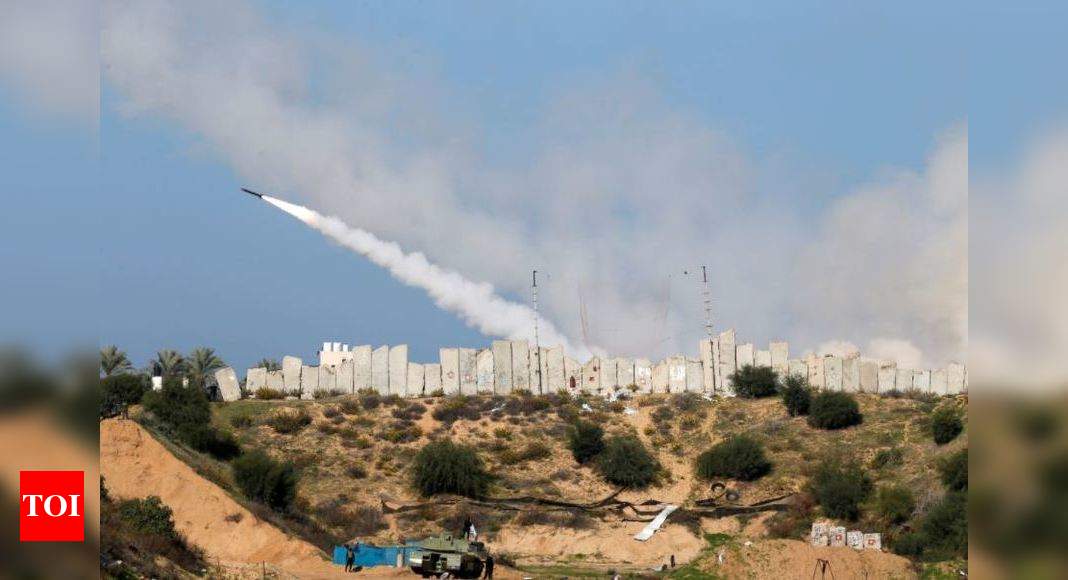 Gaza forces fire rockets to mark Israel conflict anniversary - Times of India