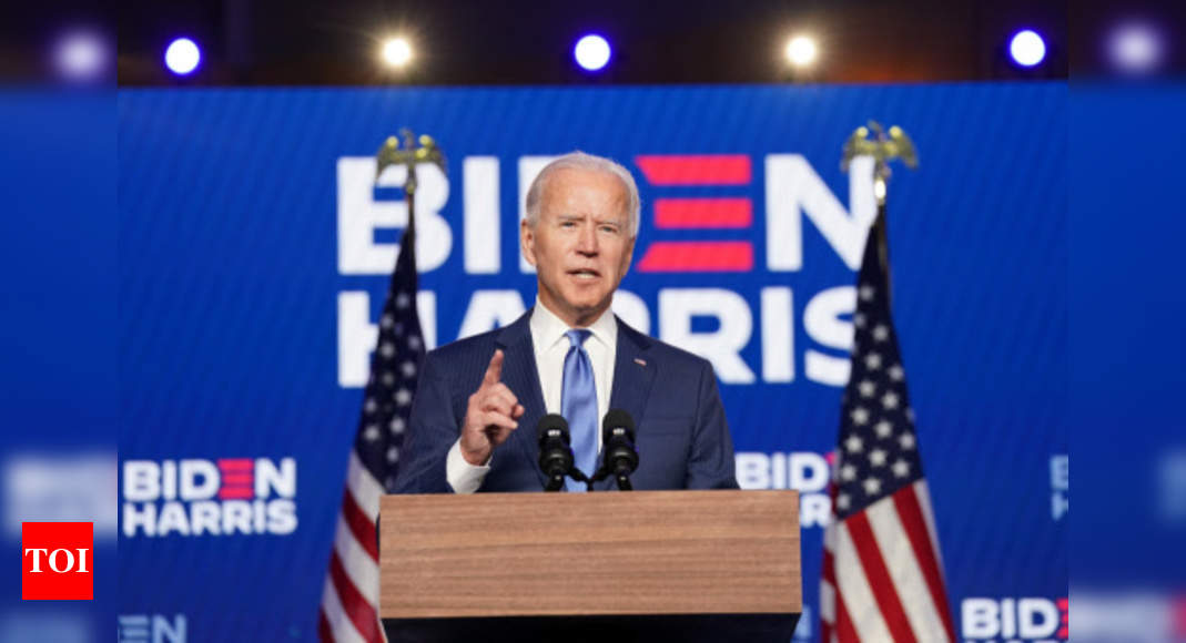 New Covid variant hits US as Biden vows all-out effort - Times of India