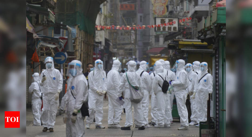 Thousands of Hong Kongers locked down to contain coronavirus - Times of India