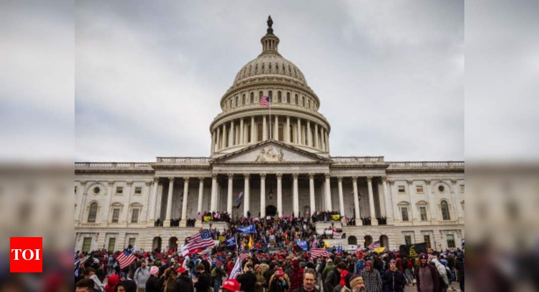 ‘They Got a Officer!’: How a mob dragged and beat police at the Capitol - Times of India