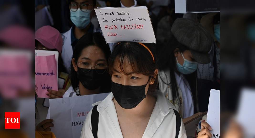 Myanmar's protesters back on the streets as US sanctions coup leaders - Times of India