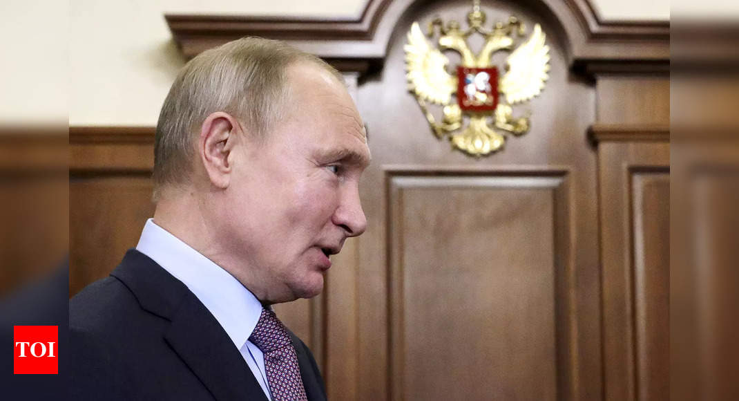 Vladimir Putin accuses West of using Navalny to 'contain' Russia - Times of India