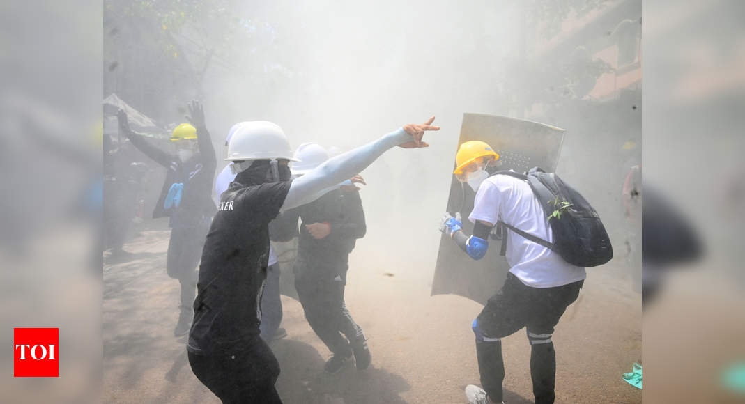 Myanmar protesters rally after overnight raids on opposition figures - Times of India