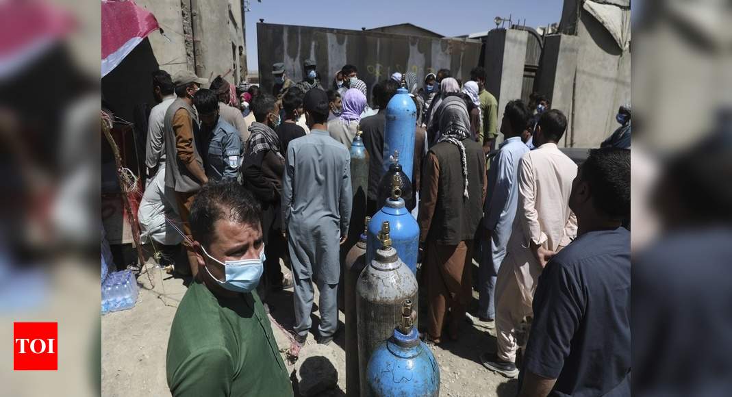 Afghanistan running out of oxygen as Covid surge worsens - Times of India