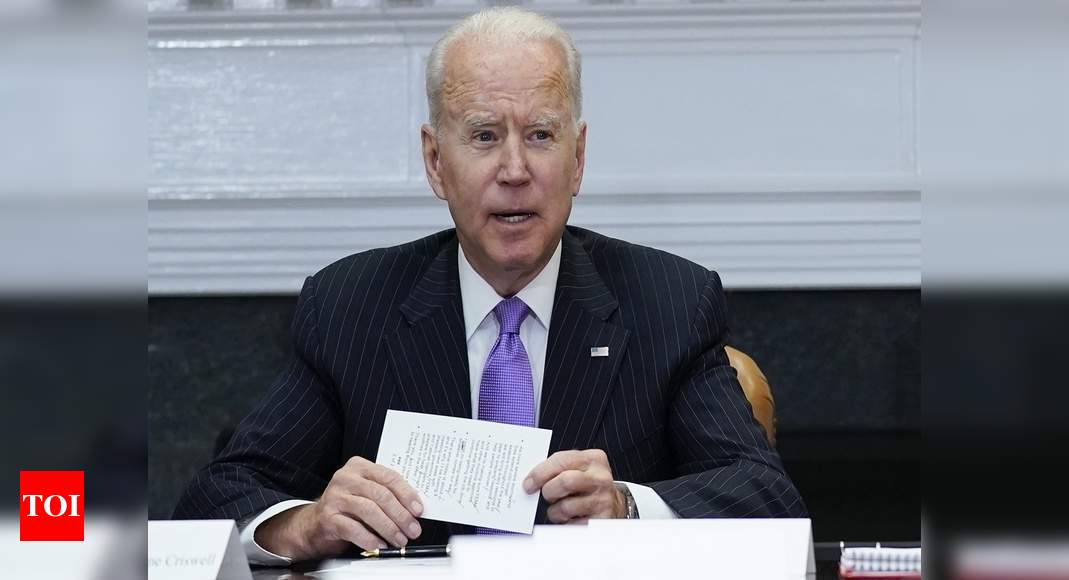 Biden faces growing pressure from the left over voting bill - Times of India