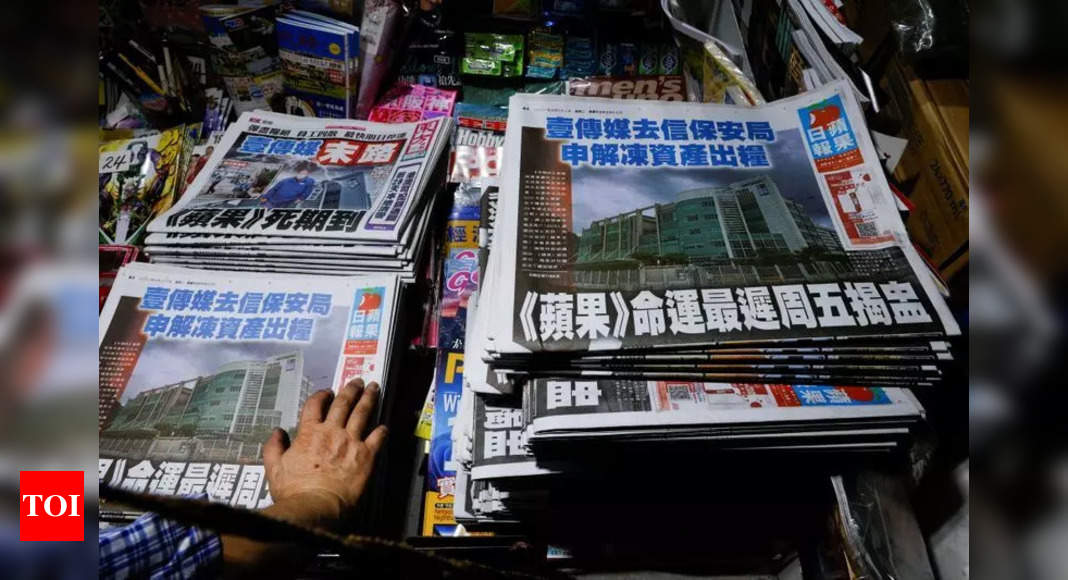 Hong Kong's embattled Apple Daily to close by Saturday - Times of India