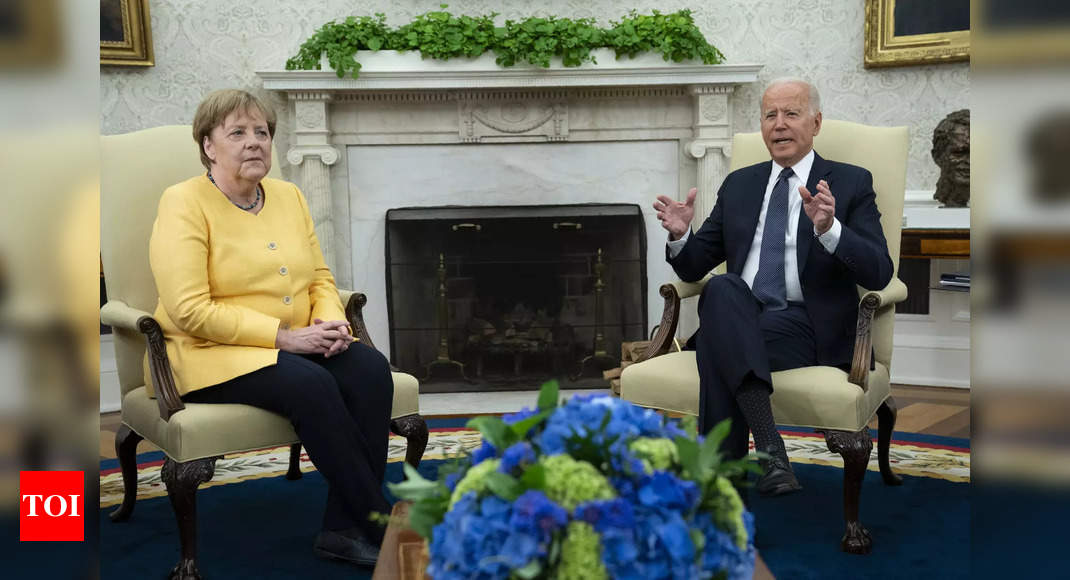 Biden, Merkel vow common front on Russia, China - Times of India