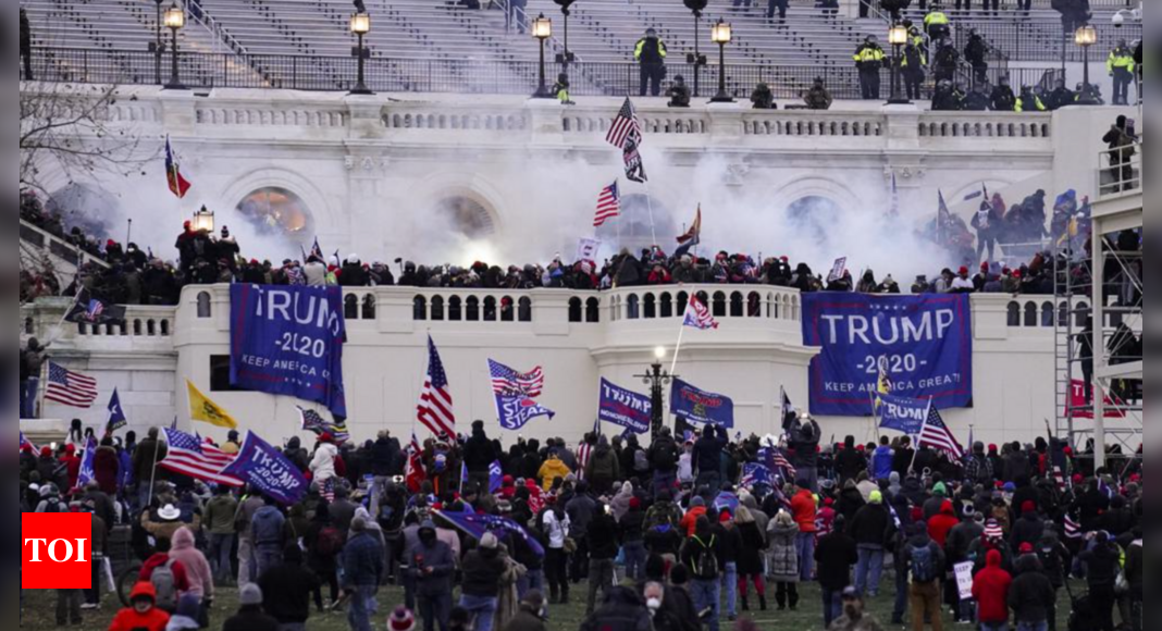 Florida group charged with attack on police during US Capitol riot - Times of India