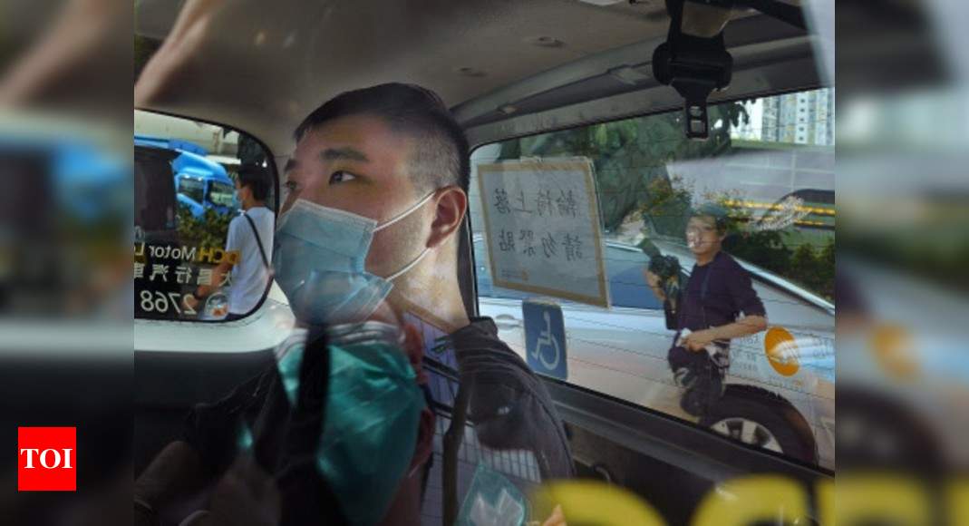 Hong Kong protester given 9-year term in 1st security case - Times of India