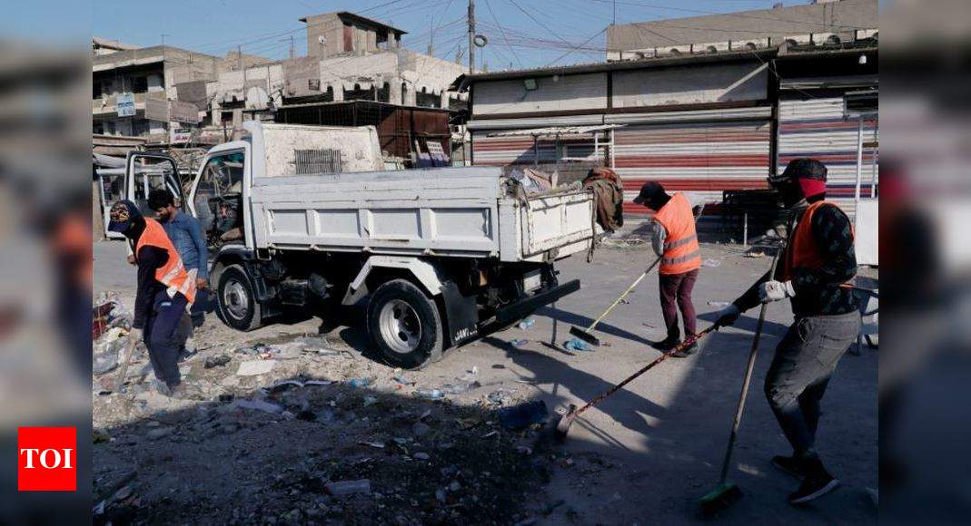 Roadside bomb kills 18 in Baghdad market: Officials - Times of India