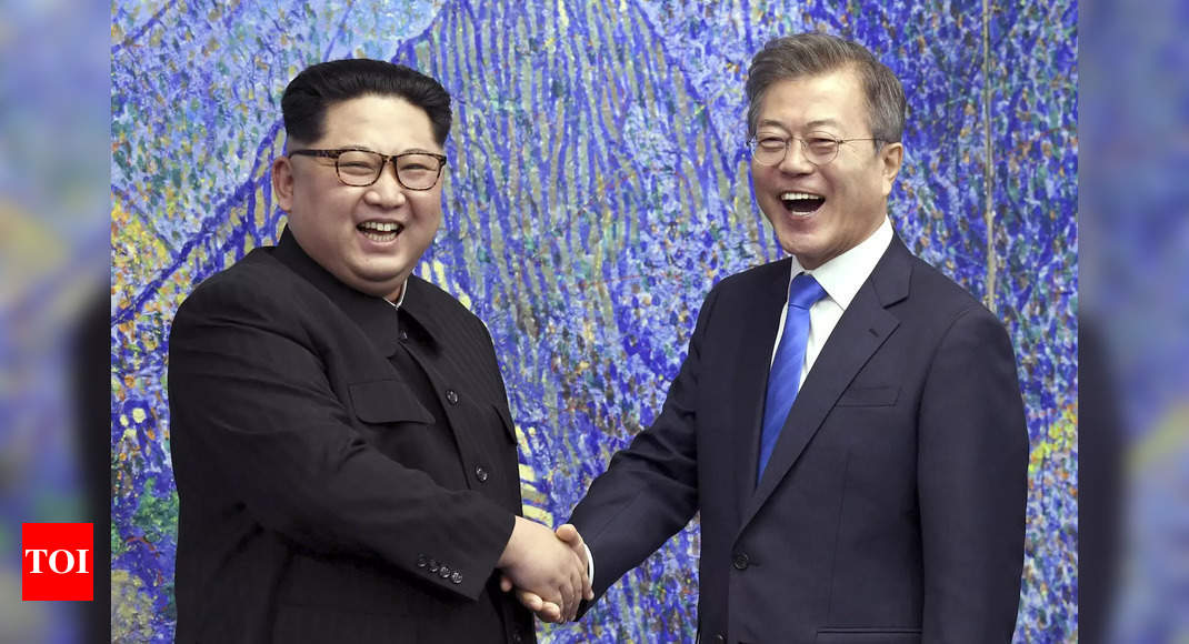 Two Koreas restore severed communications in surprise thaw - Times of India