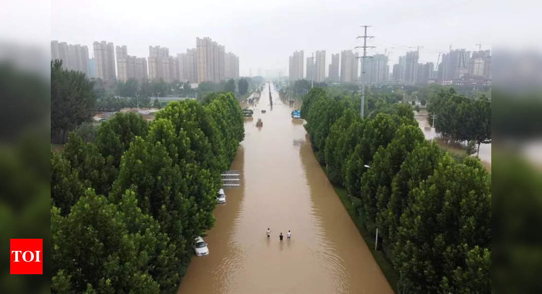 Death toll in central China floods rises to 302, 50 missing - Times of India