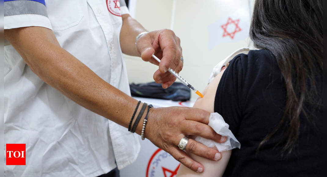 Israel sees high demand for 3rd vaccine shots - Times of India