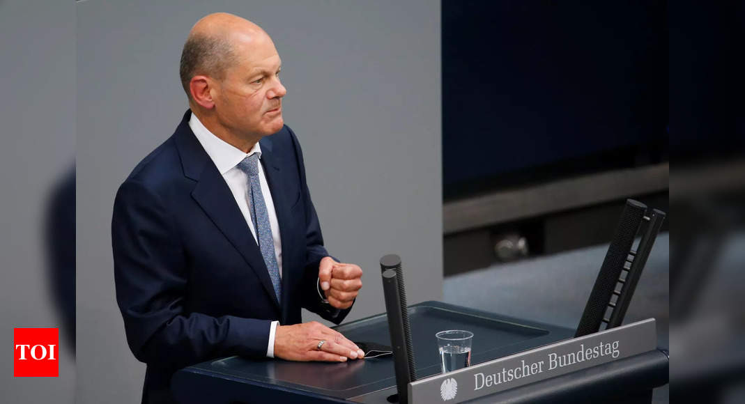 Olaf Scholz: Safe pair of hands who wants Merkel's job - Times of India